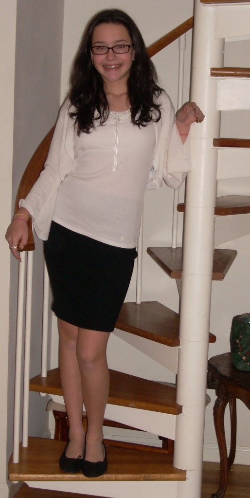 The spirial staircase was a deal-breaker for a lot of people who looked at the house. We thought it was charming -- although it has proved a logistical nightmare and wasn't real toddler-friendly! Here's Catherine headed to her choral concert two Christmases ago.