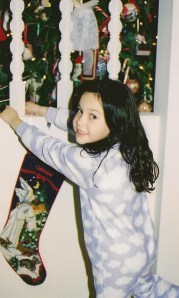 Catherine -- probably age 7 (I REALLY need to make those photo albums) -- getting ready for Santa's arrival.