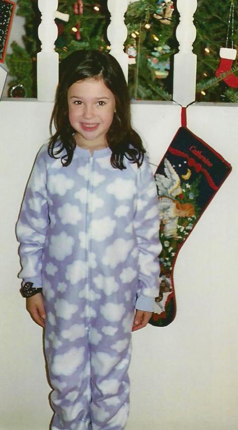 Catherine and her freshly displayed Christmas stocking in 2002. What a difference a decade makes!