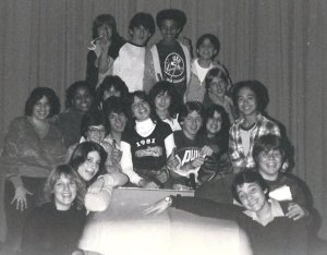 Cast and crew of "Grease," 1980, Port Chester (NY) Junior High. First of all, I can't believe how young we all are. I'm the only person wearing glasses. You likely see two of the faces in the photo on television today. One of the fellas is a choreographer, another plays in a band. The rest of us all grew up and assumed a variety of jobs. Still, if you put us together in one room, we could do a hell of a hand jive. 