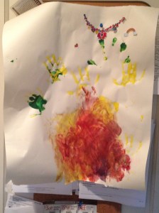 Lily's painting for Basil, decorated with the stickers she stuck all over him during lunch.