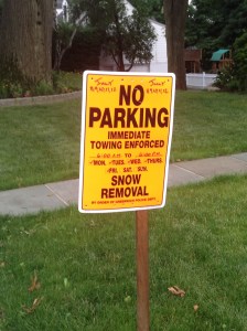 Here in Connecticut, we're enduring hot, humid weather, so you can imagine my surprise to find these signs dotted around the neighborhood. Turns out there is no weather anomaly; the streets are being paved. Still this made me laugh -- until I got several yards down the road after snapping this photo and the skies opened up with torrential rain.