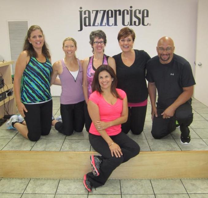 Before the sweating commences, the instructors smile for the camera.