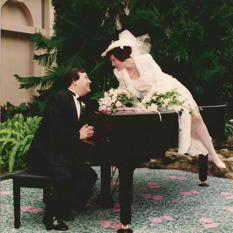 Neither of us plays piano, but it was a prop worth exploiting in the atrium of the Hyatt Regency, Old Greenwich. That goodness we rented it for photos; it poured rain all day. Showers of happiness, everyone assured us.