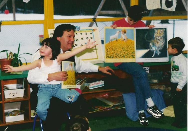 Basil and Catherine read to the kids at Mead School 13 years ago. This is back when Catherine was still very shy.