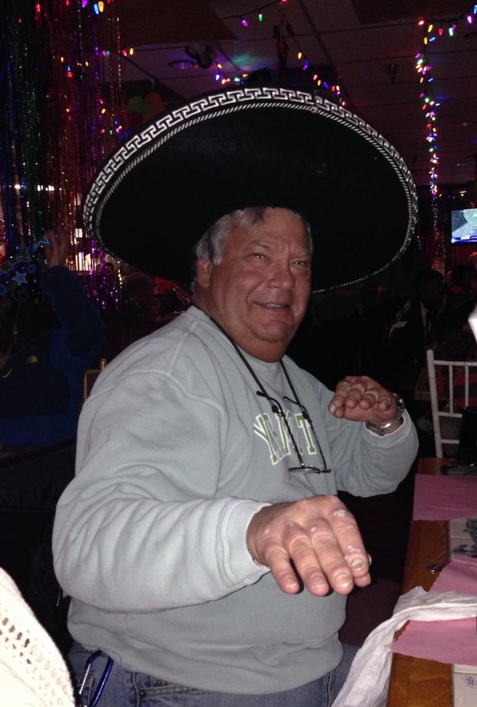 Basil, at our New Year's Eve dinner with our friends, The Ritchies, at a Mexican restaurant last night. The four kids liked Mr. Basil's look nearly as much as the grownups did.