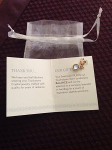 Was too shocked standing in the inflatable colon to take a photo, but here's my free Swarovski crystal. Wonder if Kristen is wearing hers on the left side or the right... 