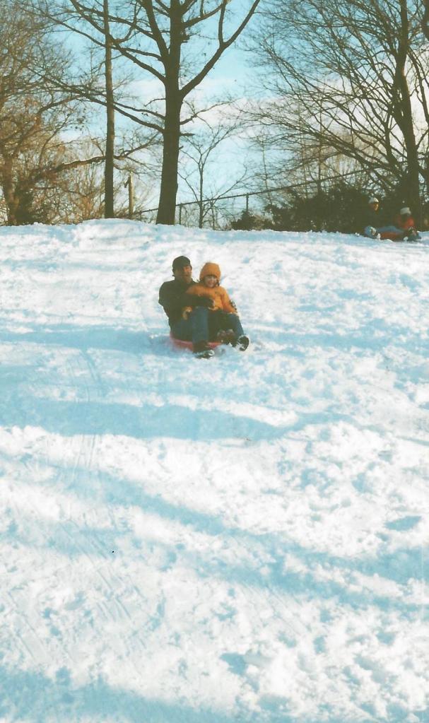 Dad helped on the first run down the hill.