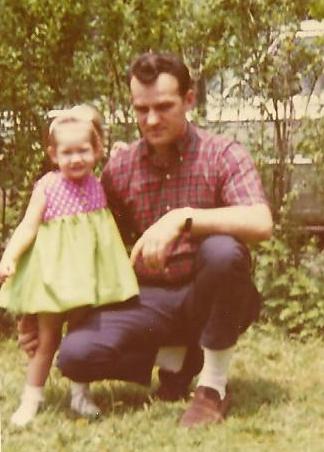 Me and Dad in 1968. I am 2 here. And no, I don't know why Dad looks so serious, but I love that even then he was still wearing his favorite 'do: The DA. (And I am rocking a pretty cool hair bow!)